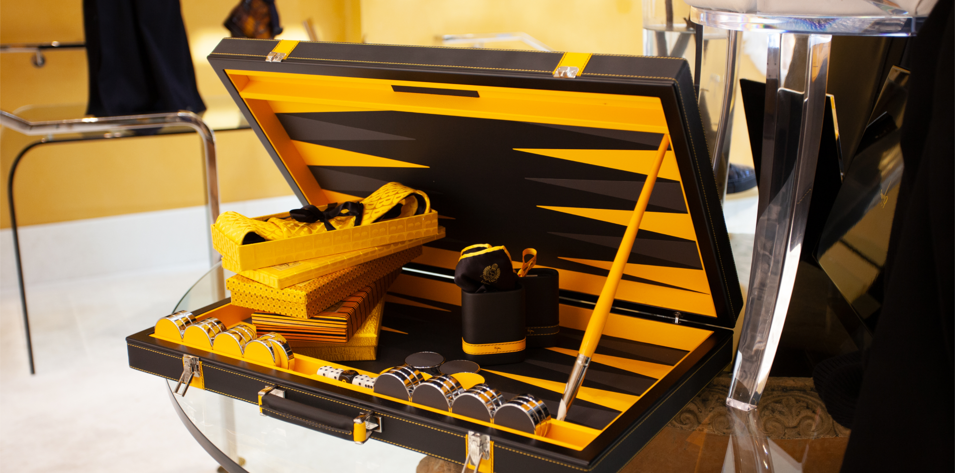 a yellow and black box with tools inside of it