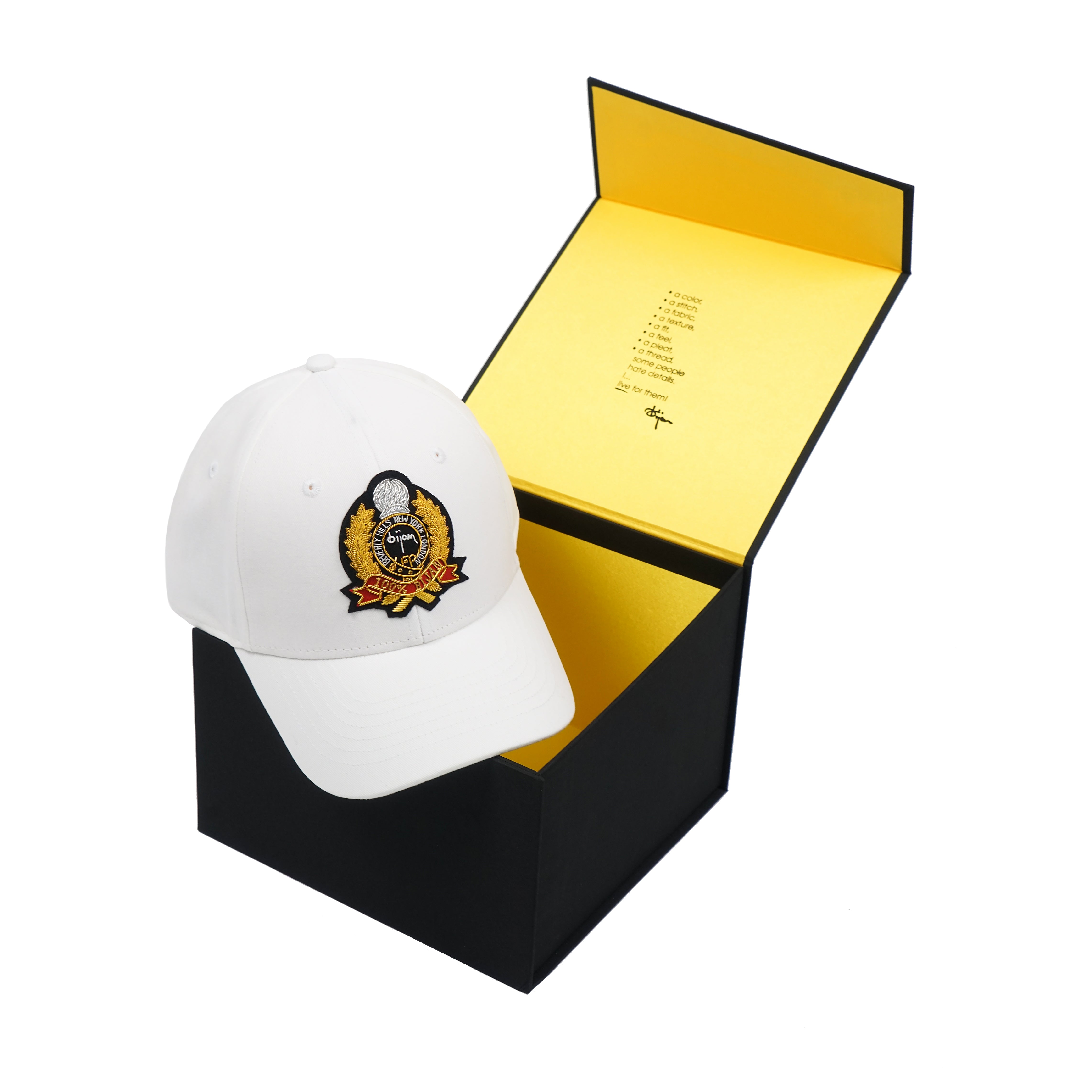 White with Gold Crest Cap House of Bijan